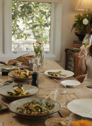 Couple enjoying food and drink at The Zin House restaurant in Eurunderee near Mudgee, Country NSW