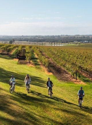 Friends on a bike ride at Sutton Estate Electric Bike Hire, Hunter Valley